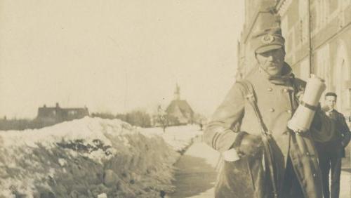 Mail carrier on the Trinity College Long Walk. (Photographer unknown, 1900)