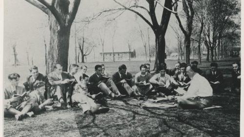 Trinity College students in class outside, main quad